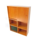 A late 20thC Danish teak hairpin cabinet, with two sliding doors, opening to reveal a single shelf