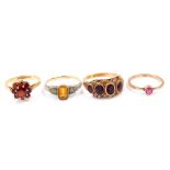 A 9ct gold and garnet flower head cluster ring, size O, together with a 9ct gold and garnet five