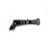A miniature 19thC waxing seal in the form of a pistol, with an carved agate handle, repousse white