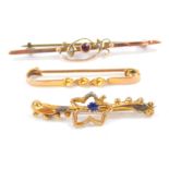 A Victorian 9ct gold amethyst and seed pearl bar brooch, 9ct gold spiral twist pin, and a 9ct gold