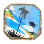 A vintage 1920's butterfly wing brooch, of canted square form, the central panel decorated with palm