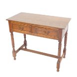 An early 20thC oak side table, 17thC style, with two frieze drawers, raised on turned legs, united