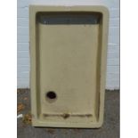 A buff stoneware Belfast sink, 94cm W, 58cm D.