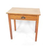 An early 20thC oak side table, with a single frieze drawer, raised on tapering square legs, 76cm