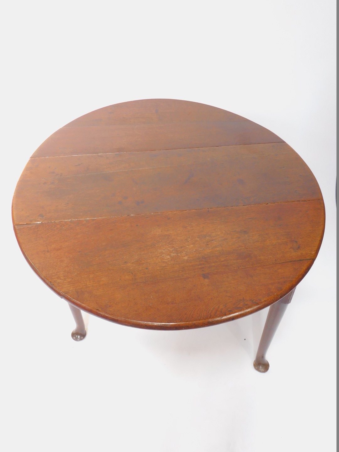 A George III oak drop leaf dining table, raised on turned legs and pad feet, 73cm H, 105cm W, 36cm - Image 3 of 3