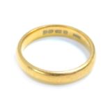 A 22ct gold wedding band, size M, 5.3g.