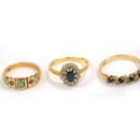 A 9ct gold and opal three stone ring, size M/N, 9ct gold sapphire and zircon ring, size T, and an