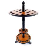 A black and pale wood effect MDF circular stick stand, to hold 23 sticks at two levels, 71cm H, 39.