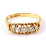 An Edwardian 18ct gold and diamond five stone ring, in a graduated claw setting, approx 1/2ct,