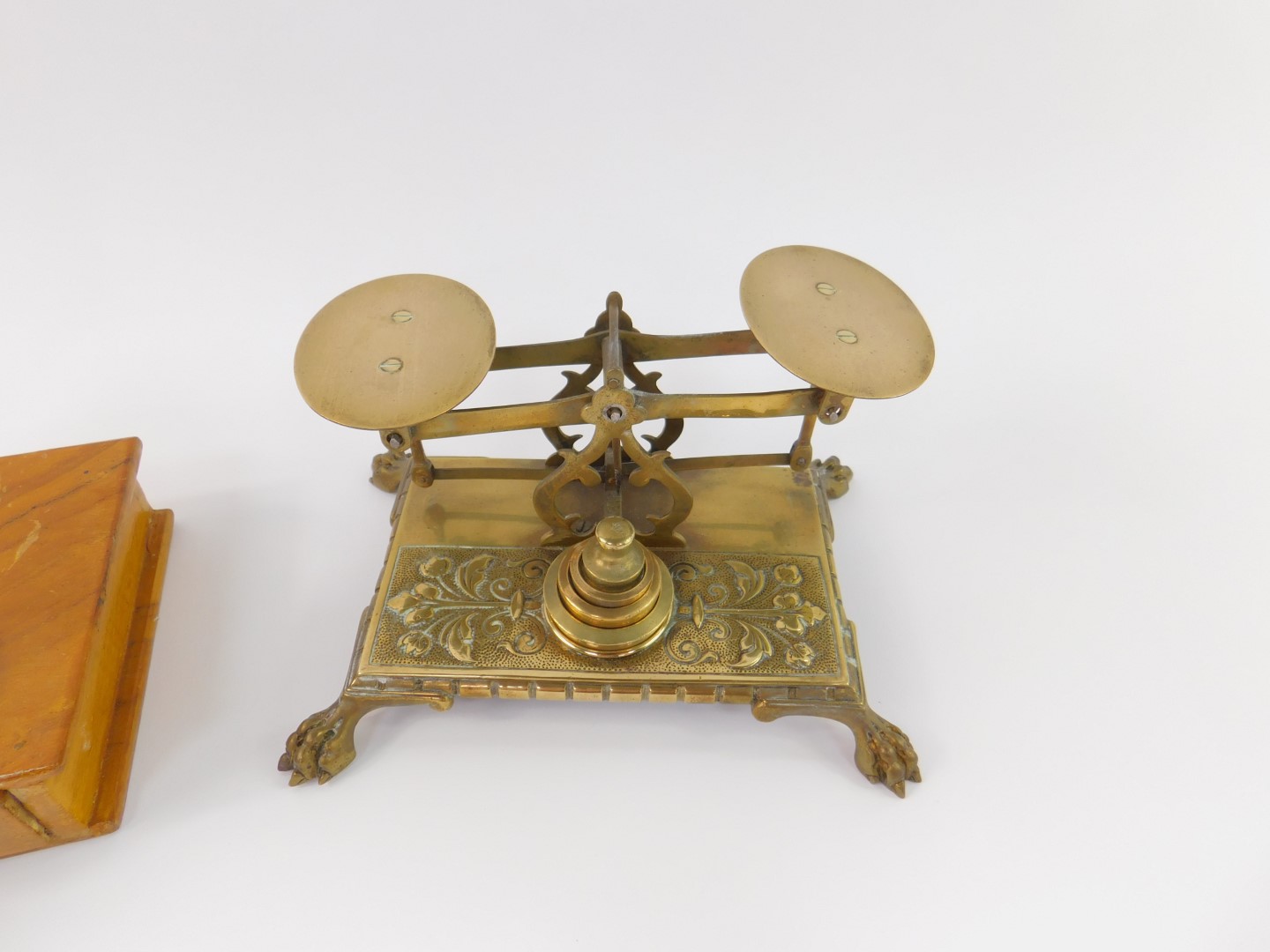 A pair of Victorian brass scales, raised on a rectangular base embossed with foliate decoration, - Image 2 of 3