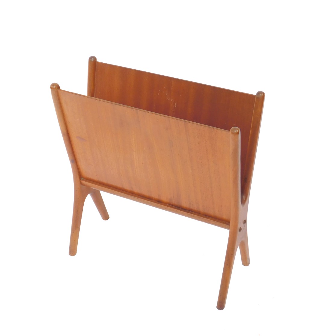 A 1960's Danish vintage teak and ply magazine rack, of vertical X-frame form, 55cm H, 50cm W, 21cm