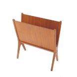 A 1960's Danish vintage teak and ply magazine rack, of vertical X-frame form, 55cm H, 50cm W, 21cm