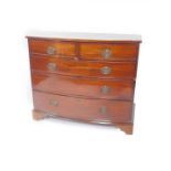 A George III mahogany bow front chest of drawers, of two short over three long drawers, raised on