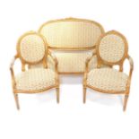 A Victorian parcel gilt salon suite in the French taste, with repeating floral overstuffed seats,