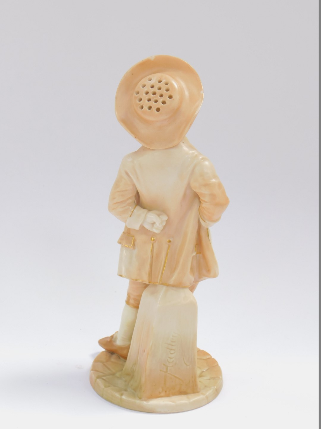 A late 19thC James Hadley Worcester porcelain sugar sifter, modelled as a standing boy in the manner - Image 2 of 4