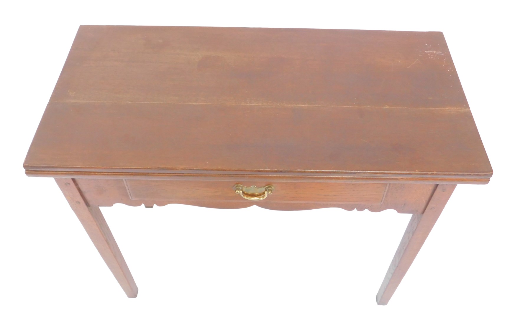 A George III oak fold over tea table, with a single frieze drawer and shaped apron raised on - Image 2 of 4