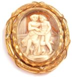 A Victorian shell cameo brooch, carved with two Roman figures in discussion, aside a column, set