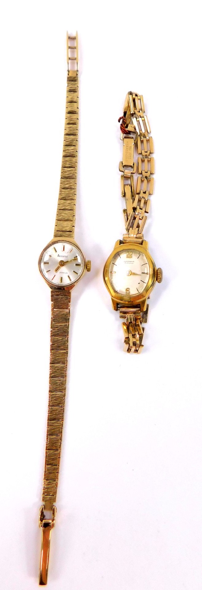 An Accurist lady's 9ct gold wristwatch, silvered dial with gold batons, on a textured gold bracelet,