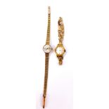 An Accurist lady's 9ct gold wristwatch, silvered dial with gold batons, on a textured gold bracelet,