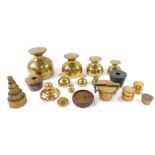 Brass and cast iron weights, including coin weights, stacking bucket weights, and chalice