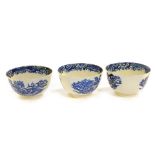 Three late 18thC blue and white tea bowls, decorated with a Chinese landscape with fishing boats and