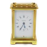 A Bayard brass cased carriage clock, enamel dial bearing Roman numerals, 8-day movement, by