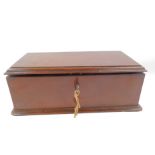 A Victorian mahogany box, of rectangular section, with internal fitted tray, raised on a plinth