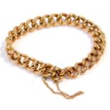 A 9ct gold curb link bracelet, on a snap clasp with safety chain as fitted, 19.2g.