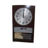A late 20thC Seiko winding wall clock, wooden rectangular case with silvered dial, bearing Arabic