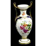 A Spode porcelain two handled vase, decorated with flower made to commemorate the 200th