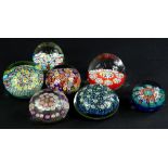 Seven Millefiore paperweights, various sizes, ages etc.