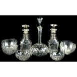 Miscellaneous glass, to include finger bowls, and three decanters and stoppers.Provenance: The