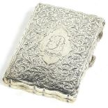 A late 19th/early 20thC white metal aide memoire, the case engraved with scrolls, the lozenge shaped