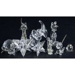 A collection of Swarovski crystal, to include elephant, a star, cat etc.