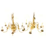 A near pair of Continental six branch chandeliers, each decorated with a Prussian type eagle,