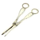 A pair of Victorian silver grape scissors, with fiddle and thread pattern handles, London 1960 by