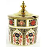 A Royal Crown Derby Old Imari pattern preserve jar, with gold plated lid, in original packaging with