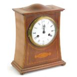 An Edwardian mahogany and marquetry mantel timepiece, the enamel dial bearing name George Tarratt