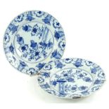 A pair of late 18th/ early 19thC Delft side plates, each decorated in tin glazes with blue