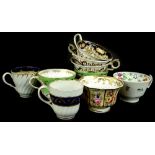 A collection of English porcelain, to include two Worcester cups, with spirally moulded bodies and