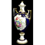 A Spode two handled porcelain vase, decorated with flowers, made to commemorate the 200th