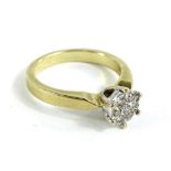 A 9ct gold dress ring, in the form of a flower and set with round brilliant cut diamonds,