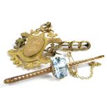 Three items of jewellery and trinkets, to include a chain bar brooch, with three links, yellow