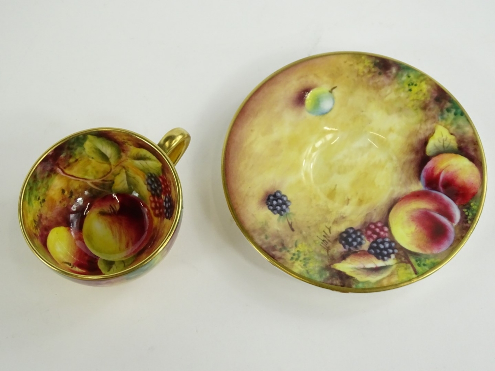 A Royal Worcester porcelain cup and saucer, painted with fruit by T Knott, printed mark in black - Image 2 of 4