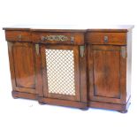 A 19thC rosewood breakfront side cabinet, with three frieze drawers, each with lion mark handles,