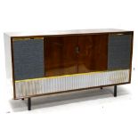 A Decca walnut cased radiogram, with turn table, radio receiver, integral speakers etc., 137cm W.