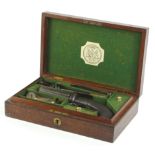 A mid 19thC pepperbox pistol, signed W.A. Beckwith of London, engraved with scrolls etc., finely