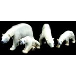 A graduated set of four Royal Copenhagen porcelain polar bears, 19-12cm.