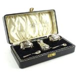 A cased George VI silver cruet set by the Aidy Brothers, comprising salt, mustard pot, pepper pot