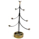 An engineer made tree shaped seven branch candle stand, with copper sconces, wrought iron arms and a